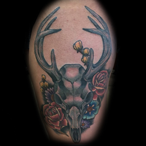 A full color traditional cactus tattoo