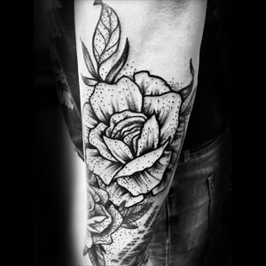 A full color traditional death moth tattoo